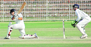 Sahil Kukreja plays a shot at Sector 16 Stadium on Wednesday.