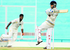 Vishwas Bhalla sends one to the fence on his way to century on Thursday. Tribune photo: Vicky Gharu
