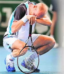 Nikolay Davydenko reacts during his match against Robin Soderling in the Paris Masters Series Tennis tournament on Thursday.