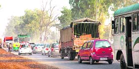 Traffic moves at a snail�s pace on the Mohali-Kharar road