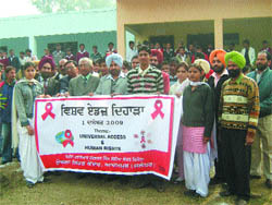 Employees of the Primary Health Centre spread AIDS awareness on World AIDS Day in Government Senior Secondary School, Admapur, on Tuesday.