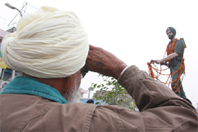 An elderly ex-serviceman salutes the statue of Jamadar Nand Singh, winner of the Victoria Cross, on his 62nd martyrdom anniversary that was observed at the Fauji Chowk in Bathinda on Saturday.