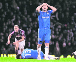 Chelsea�s Frank Lampard rues a missed scoring opportunity against West Ham in London on Sunday. 