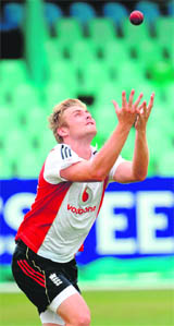 England's Luke Wright prepares to take a catch during a training session before the second Test against South Africa at Kingsmead, Durban, on Friday.