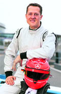 Michael Schumacher poses on a GP2 car during test drives in Spain, on Tuesday