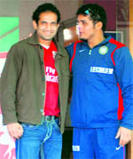 King XI Punjab�s Irfan Pathan (L) and Reetinder Sodhi at PCA Stadium in Mohali on Thursday