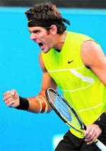 Juan Martin Del Potro celebrates a point against James Blake on Wednesday