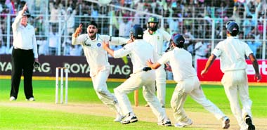 Harbhajan Singh celebrates the wicket of Morne Morkel in Kolkata on Thursday.