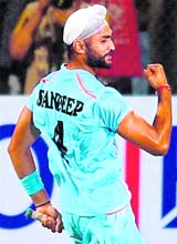 Sandeep Singh celebrates his first goal against Pakistan in New Delhi on Sunday.