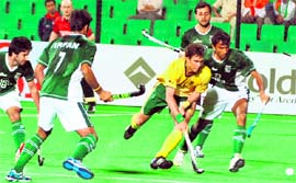 Pakistan and South African player vie for the ball on Saturday