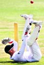 England�s Matt Prior falls during a three-day cricket match against Bangladesh A Team in Chittagong on Sunday