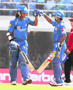 Mumbai Indians� S. Tiwari congratulates Rayudu 