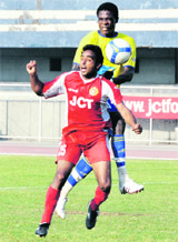 JCT and Mumbai FC�s players fight for the ball in Ludhiana on Saturday.