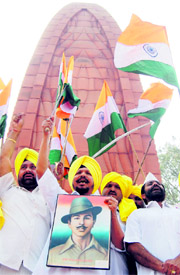 Activists of the Anti-Terrorist Front, Punjab, pay tributes to Shaheed Bhagat Singh on the eve of his martyrdom day at Jallianwala Bagh in Amritsar on Monday.