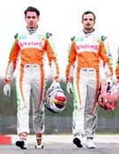 Adrian Sutil (L) and Vitantonio Liuzzi 