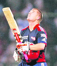 Delhi Daredevils� David Warner looks towards the sky on completing his century against Kolkata Knight Riders in New Delhi