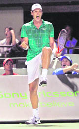 Tomas Berdych celebrates after winning a point against Robin Soderling during their semifinal at the Sony Ericsson Open tournament in Key Biscayne, Florida on Friday.