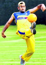 Chennai Super Kings skipper MS Dhoni during a practice session at MAC Stadium in Chennai on Monday. � PTI