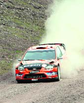Henning Solberg and his co-driver Ilka Minor drive his Ford Focus WRC on the first day of the Turkey Rally during the FIA World Rally Championship near Istanbul,on Friday.