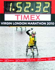 Tsuchida Wakako of Japan celebrates as she wins the women's wheelchair London marathon, in London on Sunday. Tsuchida won with a time of 01:52:33.