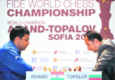 Indian Viswanathan Anand plays against Veselin Topalov during their second game of the FIDE World Chess Championship at Sofia�s Military Club on Sunday.
