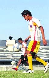 East Bengal players during a practice drill in Ludhiana on Saturday. JCT take on formidable East Bengal in their last I-League home tie here on Sunday. The match kicks off at 4.30 pm.