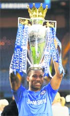 Chelsea�s Didier Drogba celebrates after winning the English Premier League at Stamford Bridge in London on Sunday.