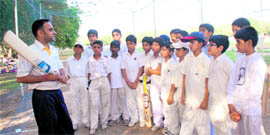 Former HP Ranji Trophy cricketer Rajiv Nayyar giving tips to budding cricketers at the St. John�s Cricket Academy, Chandigarh. Nayyar has been appointed as cricket coach at Saint John�s High School, sector 26 here