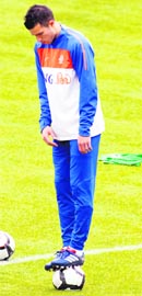 Robin van Persie of the Dutch national soccer team balances on the ball during a training session in Hoenderloo on Thursday.
