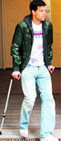 Michael Ballack uses crutches as he leaves the practice of sport medicine specialist Hans-Wilhelm Mueller-Wohlfahrt in Munich on Tuesday