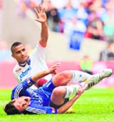 Boateng reacts after the challenge on Ballack