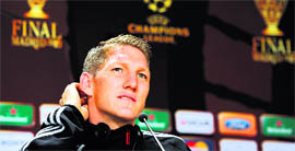 This handout photo made available by the UEFA shows Bayern Munich's Bastian Schweinsteiger addressing a press conference in Madrid on Friday. Inter face Bayern Munich for the UEFA Champions League title at the Santiago Bernabeu in Madrid on Saturday