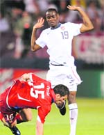 Maurice Edu (R) of the US and Martin Fenin (L) of Czech Republic fight for the ball on Tuesday. 