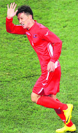 N Korea�s defender Ji Yun-Nam celebrates after scoring during the World Cup match against Brazil on Tuesday in Johannesburg.