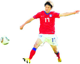South Korea�s midfielder Lee Chung-Yong scores during their Group B match in Soweto on Thursday.