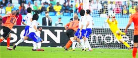 Japenese goalkeeper Eiji Kawashima unsuccessfully tries to save a shot from Netherlands� Wesley Sneijder on Saturday.