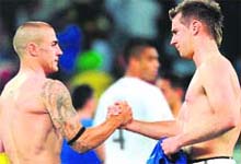 Italian captain Fabio Cannavaro shakes hands with New Zealand�s Shane Smeltz on Sunday. 