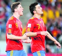 Spain require forwards David Villa and Fernando Torres (L) to find 
