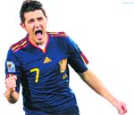 Spain�s striker David Villa celebrates after scoring during their match in Pretoria on Friday. 