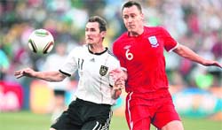 Germany�s Miroslav Klose (left) vies for the ball with England�s John Terry during a World Cup second-round 