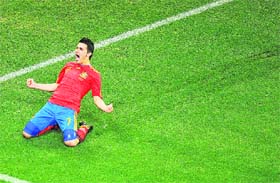 Spain�s David Villa celebrates after scoring the winning goal against Portugal