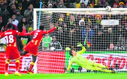 Ghana's striker Asamoah Gyan�s (3) penalty kick hits the crossbar during their quarterfinal in Soweto on Friday