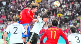 Spain�s Carles Puyol scores the winner against Germany on Wednesday.