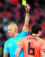 Howard Webb books Van Bommel