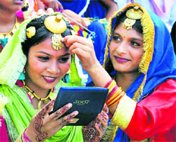 Girls prepare for a rehearsal in Amritsar on Friday