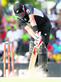Darryl Tuffey is cleaned up by Lasith Malinga in Colombo