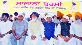 (From right) Former Union Minister Sukhdev Singh Dhindsa, former BJP President Rajnath Singh, JD(U) President Sharad Yadav, Chief Minister Parkash Singh Badal, Industries Minister Manoranjan Kalia and Deputy Chief Minister Sukhbir Singh Badal attend Sant Longowal's death anniversary function in Longowal village on Friday