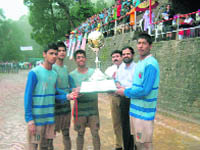 BCS, Shimla, team with the winners trophy on Friday. 