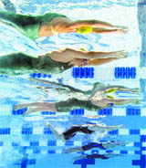 Leisel Jones of Australia (top) followed by teammate Samantha Marshall swim during their heat of the women's 100m breast stroke at the Pan Pacific swimming championships in Irvine, California, on Thursday.