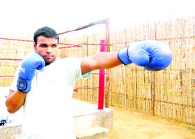 Boxer Arun Kumar at a training centre in Rohtak